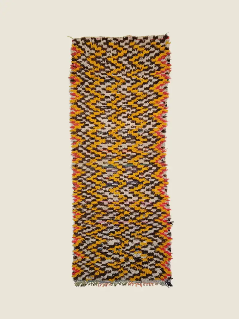 Vintage Azilal rug 90x245cm, handcrafted berber runner with sunset gold and slate blue geometric motifs.