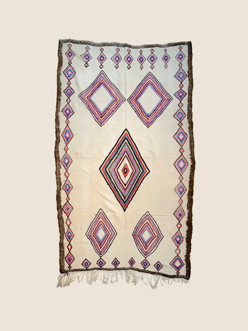 Vintage Azilal rug 240x150cm, handwoven wool featuring light teal and warm brown abstract patterns.