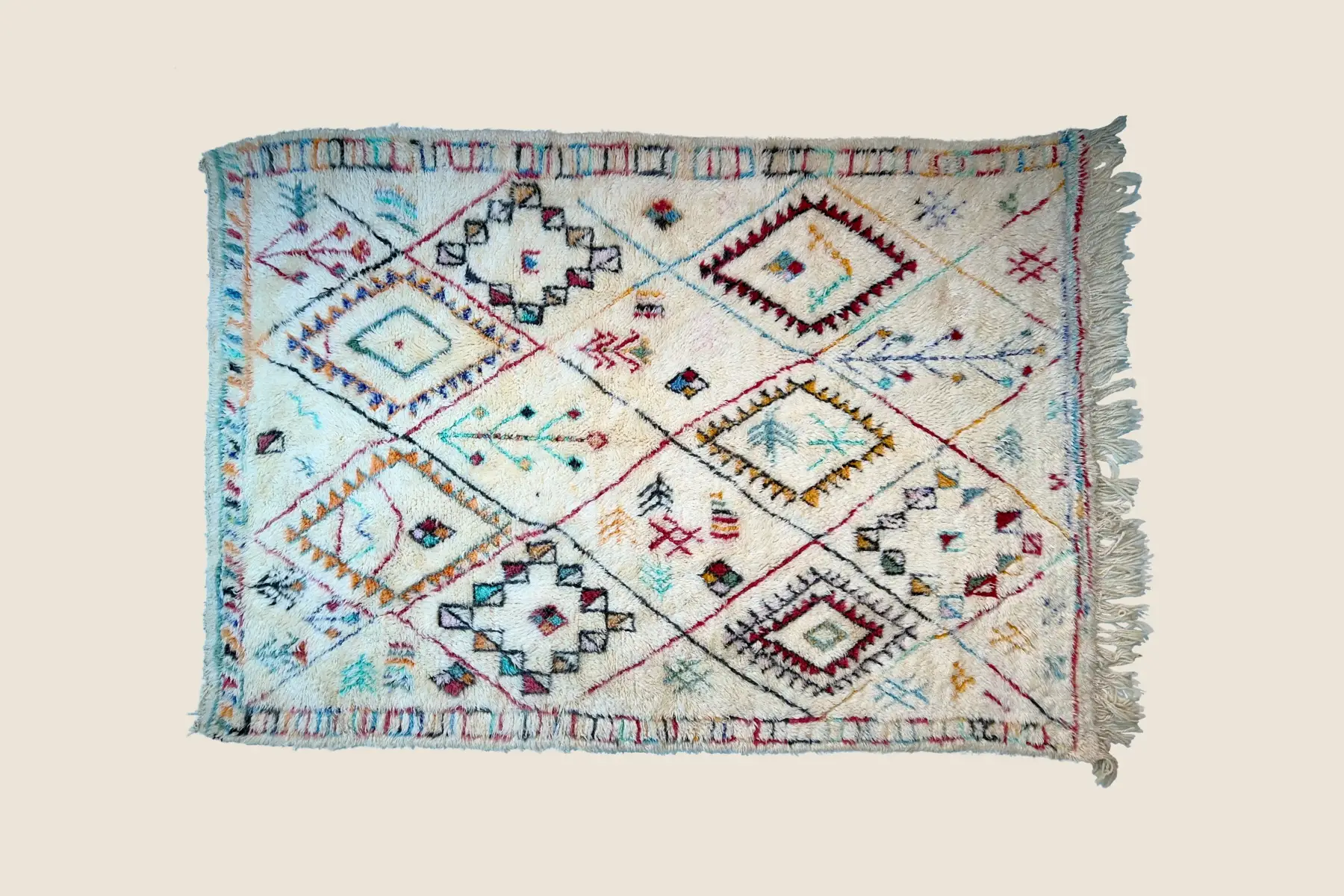 Azilal geometric weave detail showing hand-spun wool texture and natural dye craftsmanship