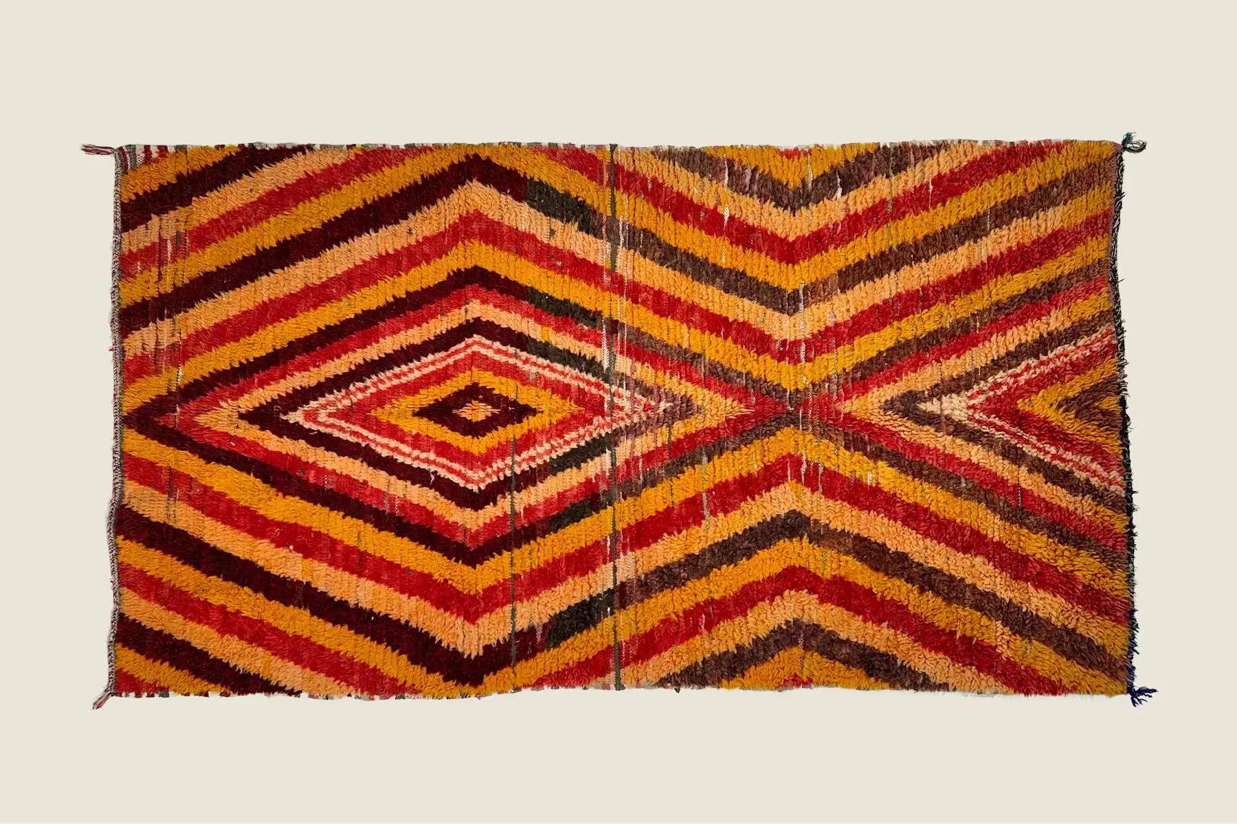 Beni M'Guild hand-knotted pile detail showing vibrant tribal pattern and traditional weaving craftsmanship