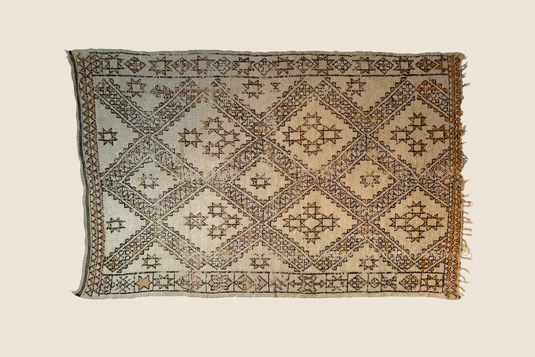 Beni M'Guild hand-knotted texture detail showing plush pile and charcoal gray geometric motifs