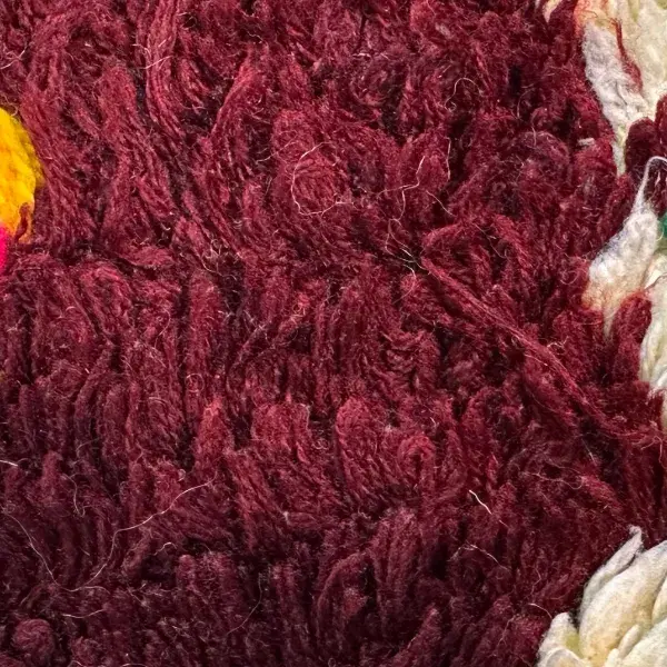 Dark maroon red symbol