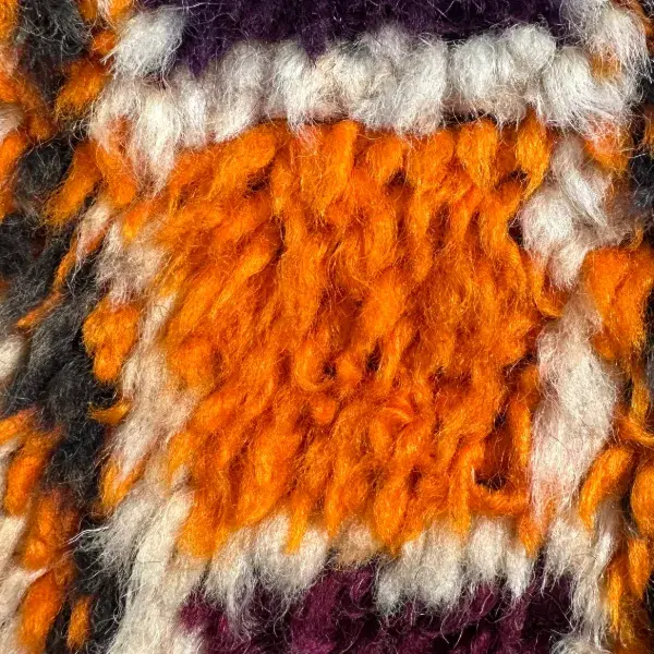 Vibrant orange diamond symbol.