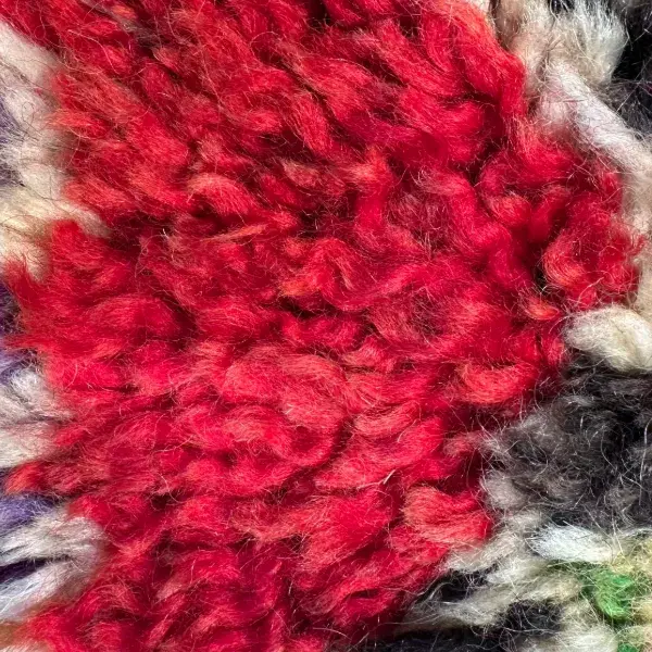 Deep crimson red color swatch for Beni M'guild rug.