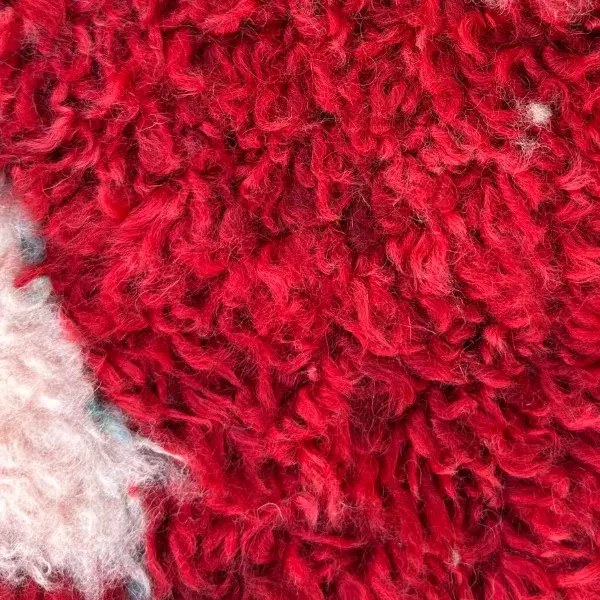 Deep crimson red color swatch from the Beni Mguild collection, RGB 201, 20, 46.