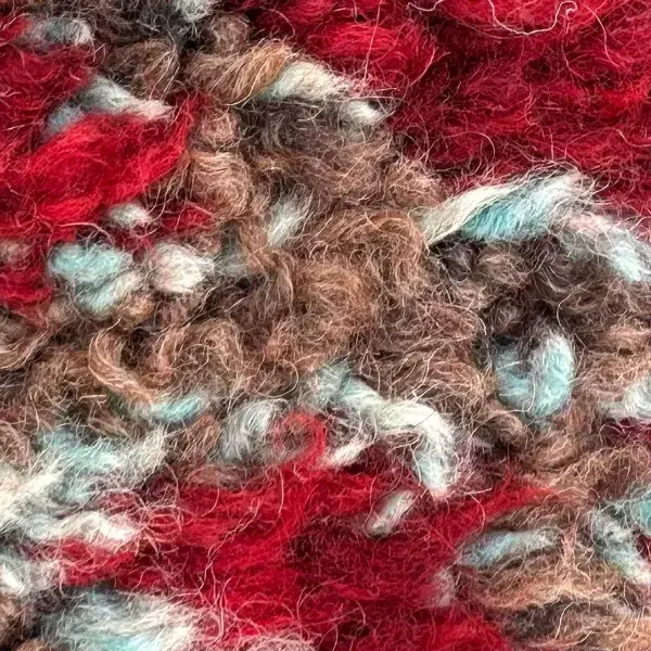 Color swatch of warm medium brown, a muted orange-brown tone from the Beni Mguild rug collection.