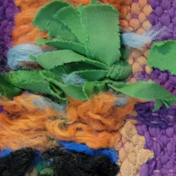 Chichaoua rug color swatch in a medium sage green