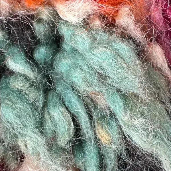 A light greenish-blue color swatch, similar to seafoam or mint, with the hex code #b2