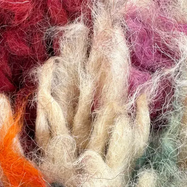A warm light beige color swatch from the Marmoucha product line, part of the orange color family.