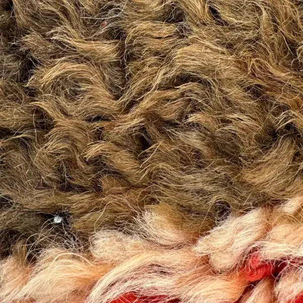 A color swatch labeled "Medium Warm Brown" from the Marmoch product line, showing a rich, warm orange-brown shade