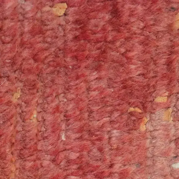 Minimalist diamond rug in a muted brick red.