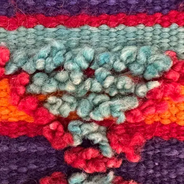 Slate gray diamond symbol on a green background