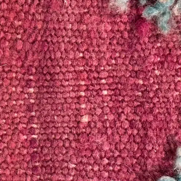 Zigzag rug in a dusty rose red.