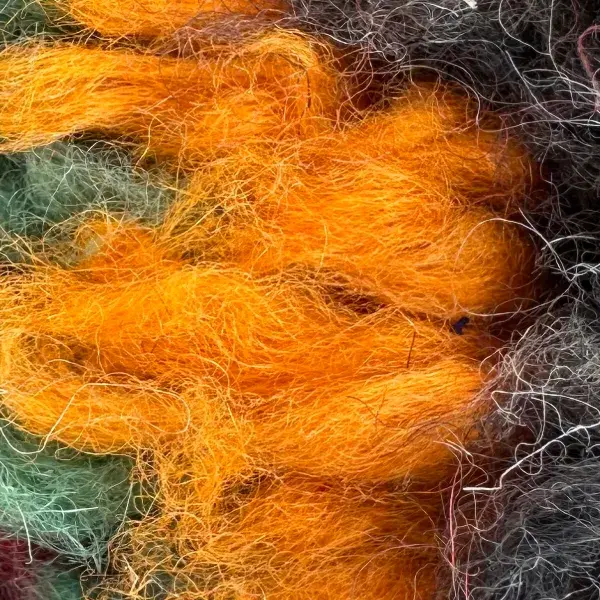 A warm orange color swatch labeled Talsint, with hex code f6820a.