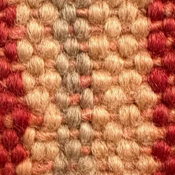 Zigzag pattern in a light warm beige, a pale orange shade.