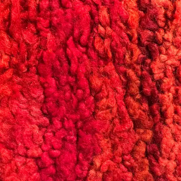 Vivid red rug with gazon symbols