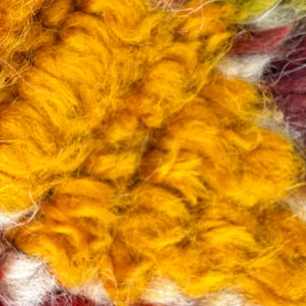 A color swatch labeled Warm Golden Yellow from the Talsint product line, showing a rich, warm orange-yellow hue